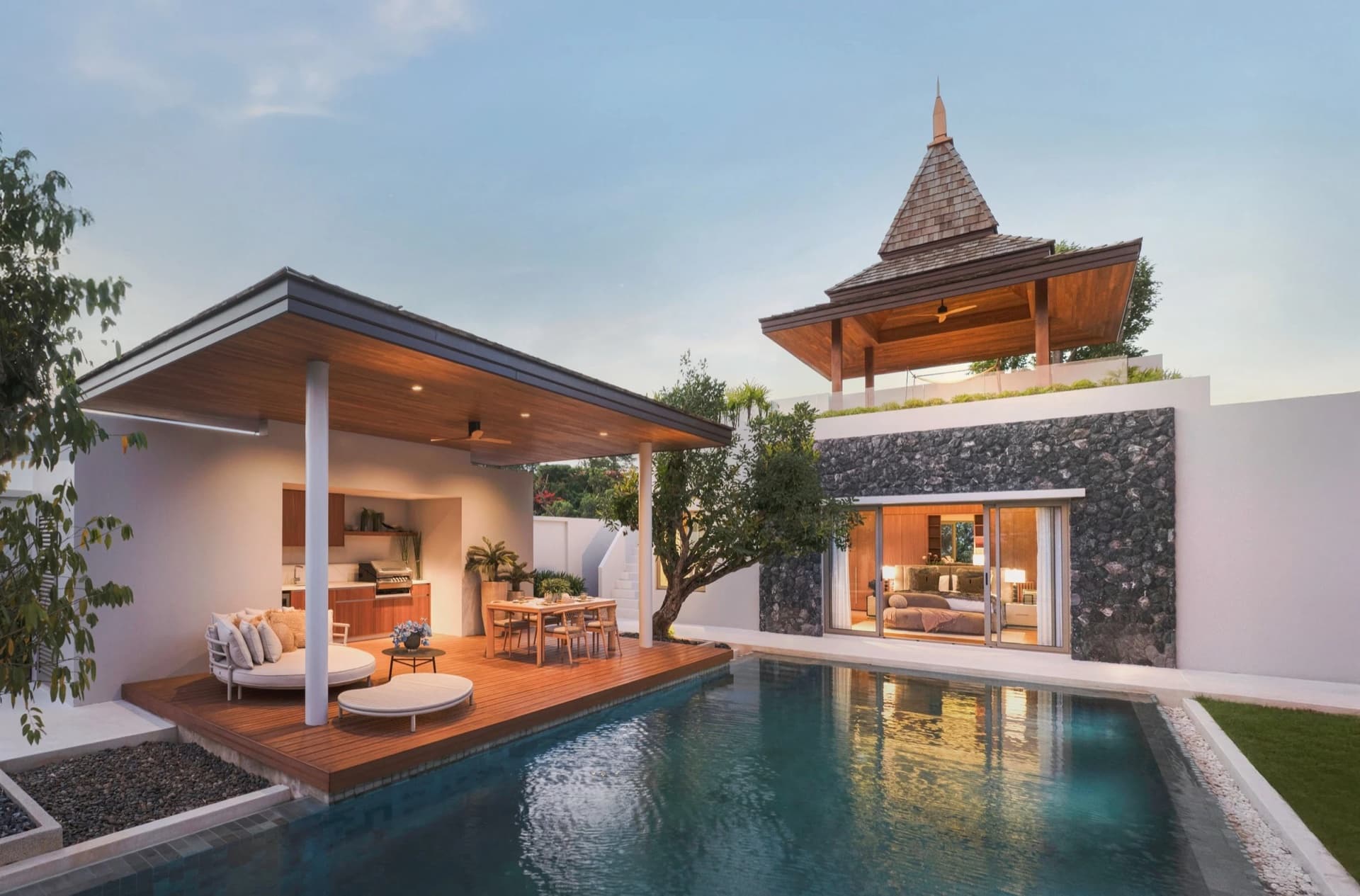 Botanica Four Seasons — outdoor terrace with pool view and dining area